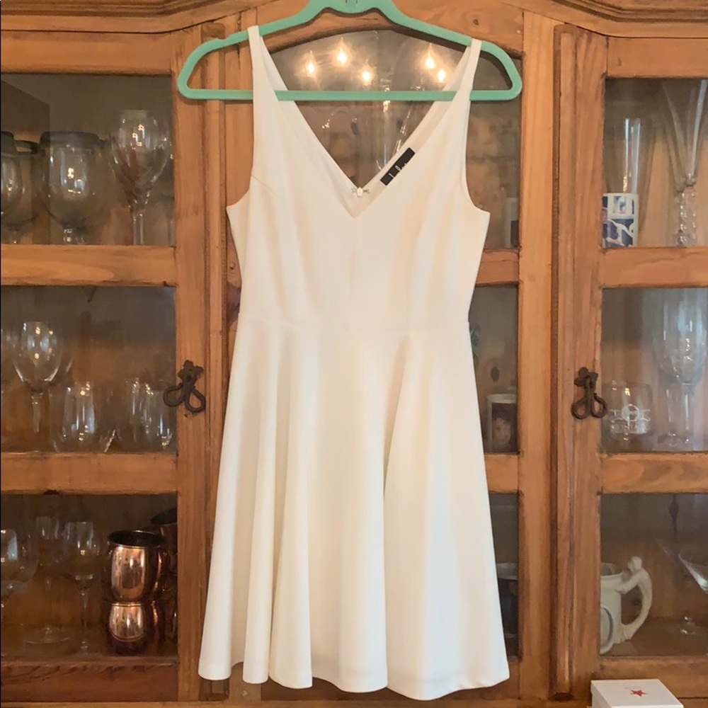 white fit and flare dress